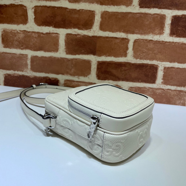 G*u*i gg embossed mini bag