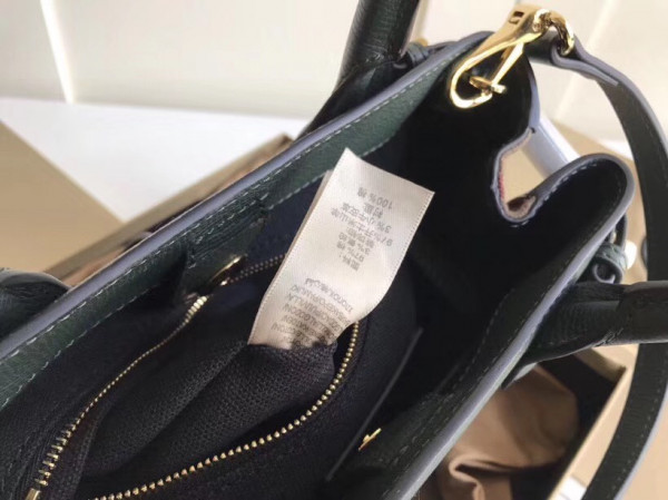 B**rry the small banner in leather and house check