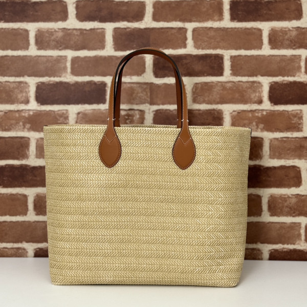 G*u*i medium straw-effect tote