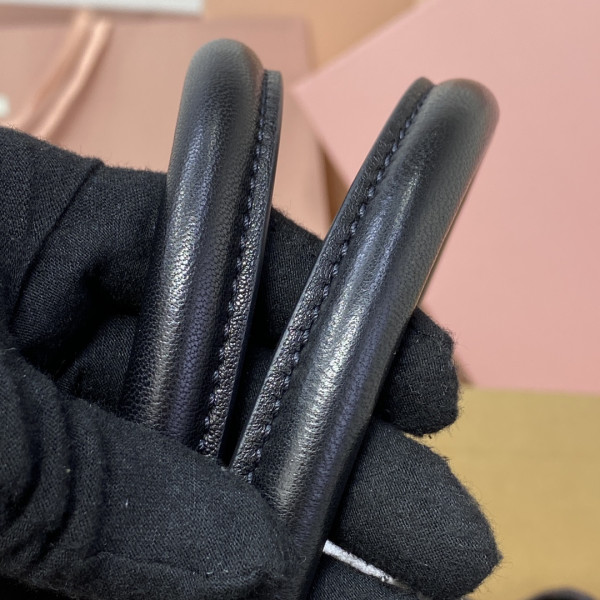 M*um*u aventure nappa leather bag