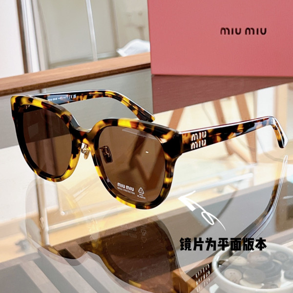 M*um*u sunglasses